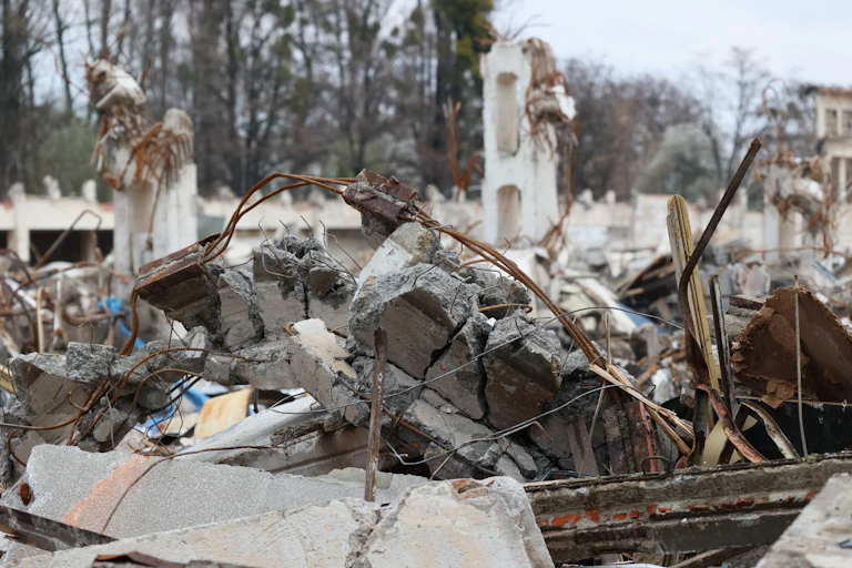 An apartment building in a city destroyed by shelling.