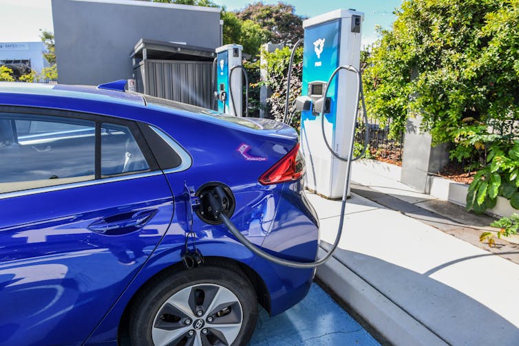 Electric car at charging station