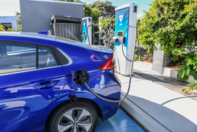 Electric car at charging station