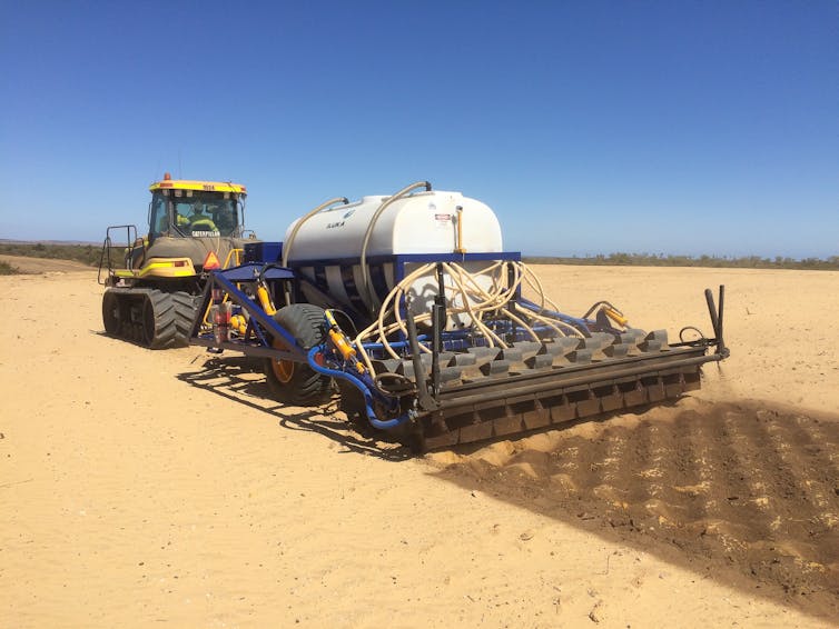 Seeding machine working at the Eneabba rare earths refinery site.