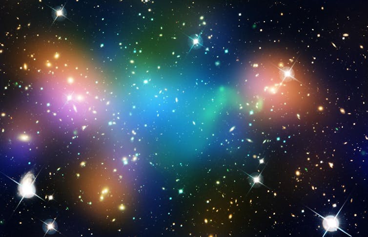 multicoloured galaxies against a black background