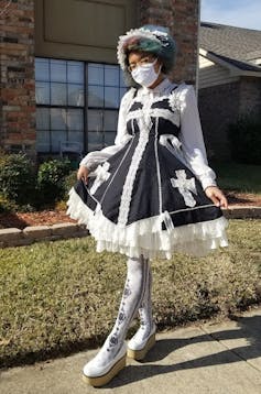 A woman dressed in the Gothic Lolita style.