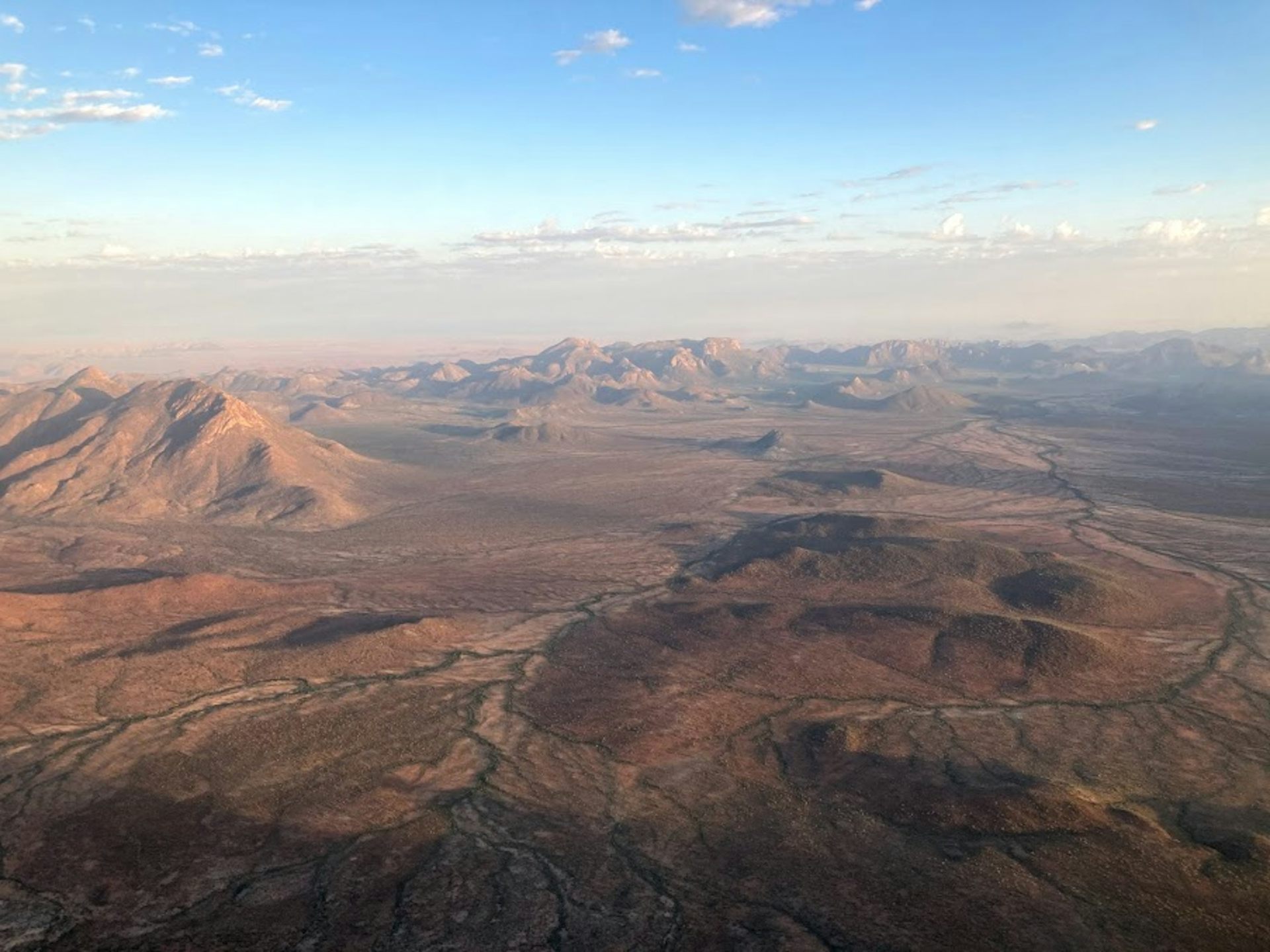 A dry, mountainous landscape seen from above.