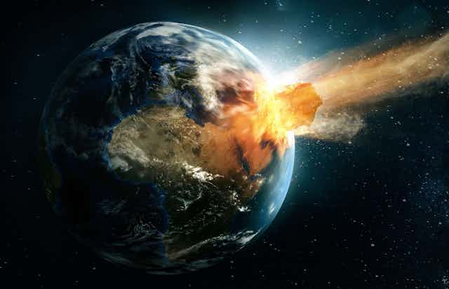 Illustration showing a large asteroid hitting Earth