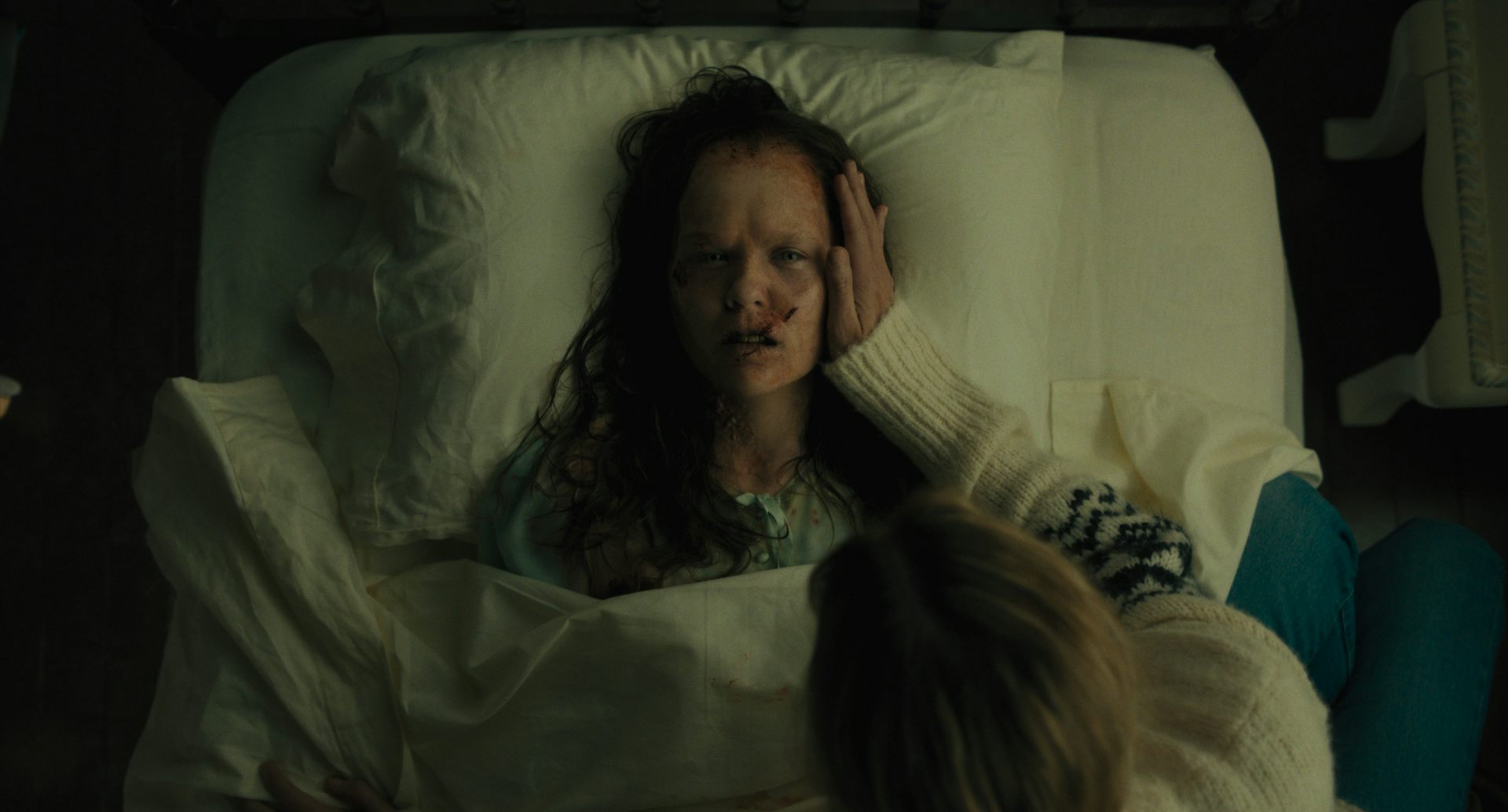 young girl lying in bed