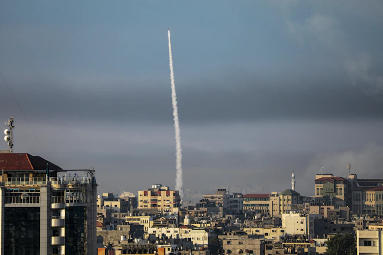 A rocket launches into sky.