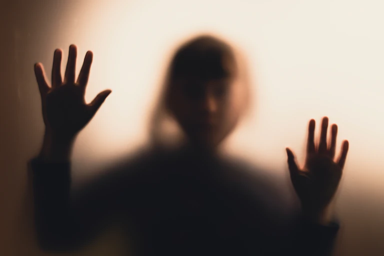 A shadowy figure