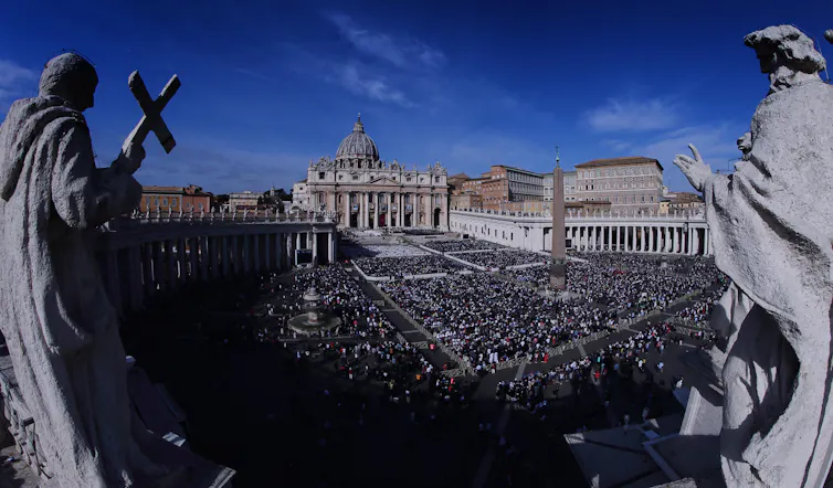 Huge crowds of people gather in the Vatican City