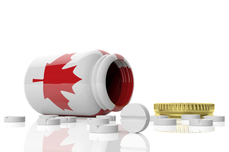 A pill bottle with a Canadian flag on it, tipped sideways