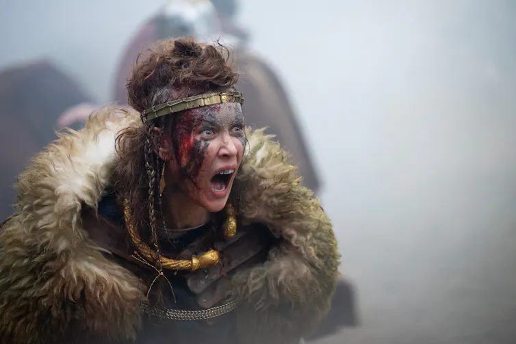 Boudica screaming in her war paint.