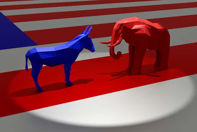 An artistic rendering of a blue donkey facing a red elephant as they face each other while standing on a flat field replicating an American flag.