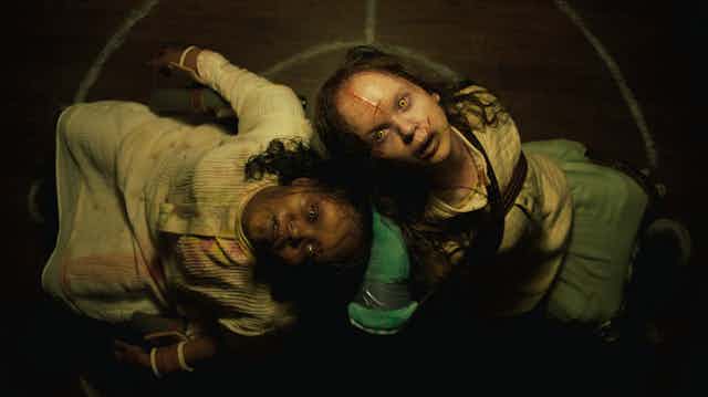 Production image: two possessed girls