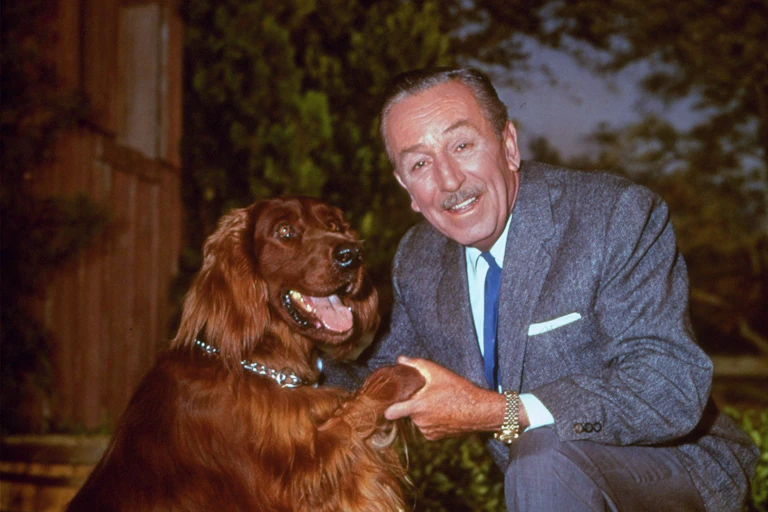 Walt Disney with a dog.