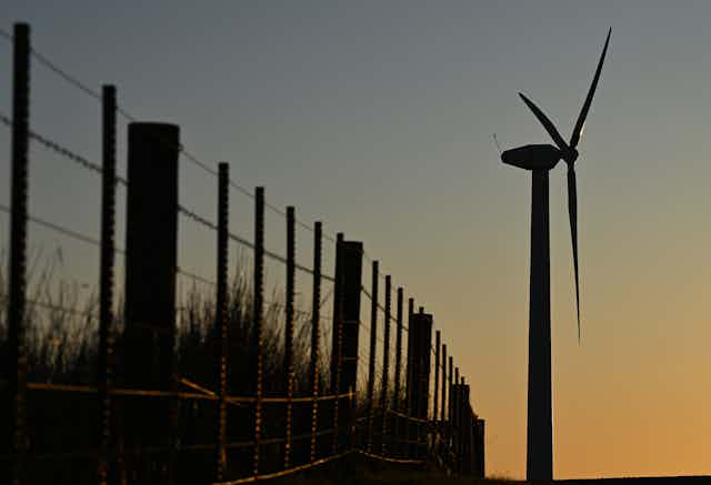 Wind turbine at sunrise or sunset in Tasmania.