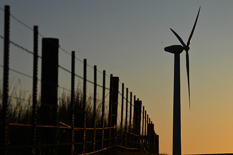 Wind turbine at sunrise or sunset in Tasmania.