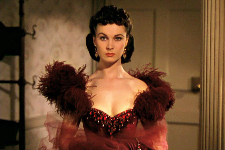 Viviene Leigh as Scarlett O'Hara in her glamorous red dress.
