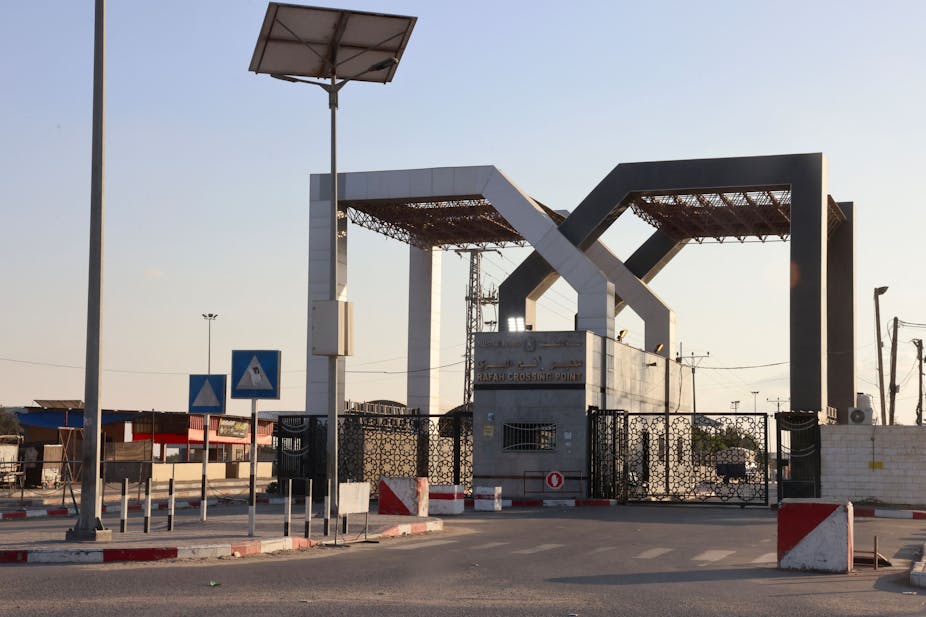 A large cement gate is pictured at the border of Gaza and Egypt.