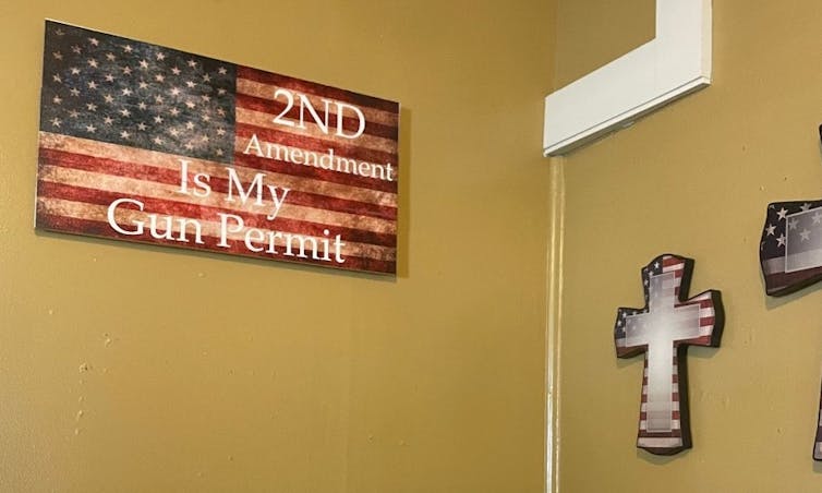 Image of an American flag on a plaque reading The 2nd Amendment is my Gun Permit