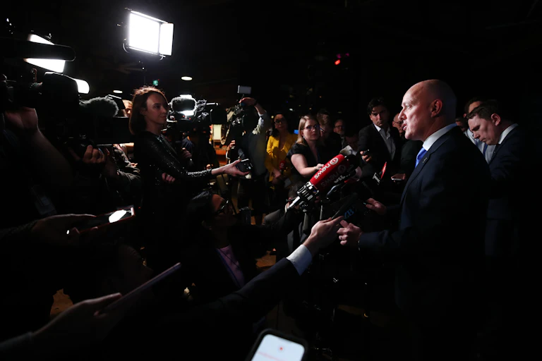 Christopher Luxon speaks to crowd of media