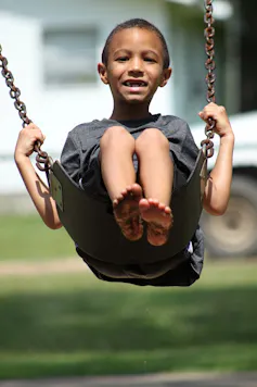 Boy swings