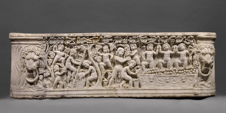 Sarcophagus representing a Dionysiac Vintage Festival. A.D. 290–300. On the left erotes are picking grapes with the aid of ladders from vines on trees.