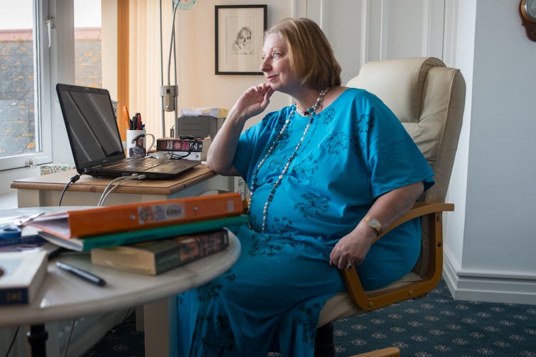 Hilary Mantel sat at the desk she wrote at in her home in East Devon.