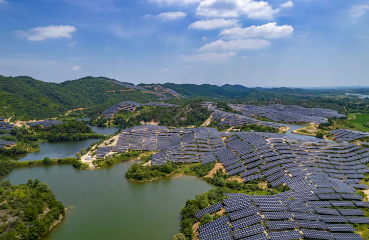 Aerial view of solar panels at a solar power station in Xinyu, China.