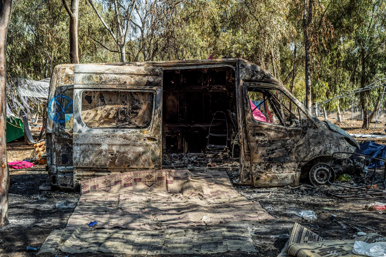 Remain of a burnt out vehicle.