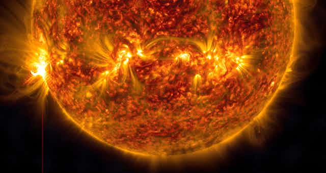 An X1.2 class solar flare is captured on the Sun (left hand side of the image) in this image from January 5 2023.