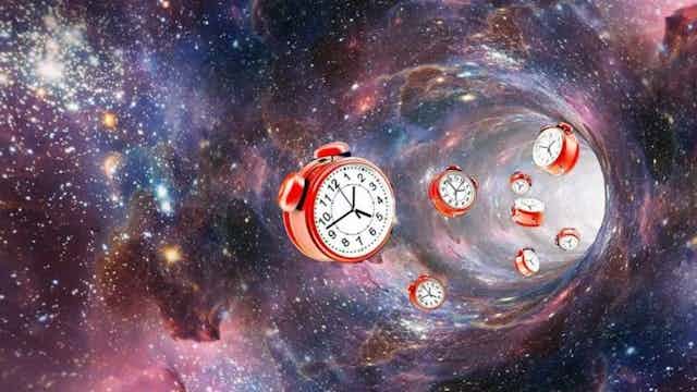 how many time travel paradoxes are there a graphic of a tunnel in outer space with eight analog alarm clocks appearing to tumb;e through the tunnel