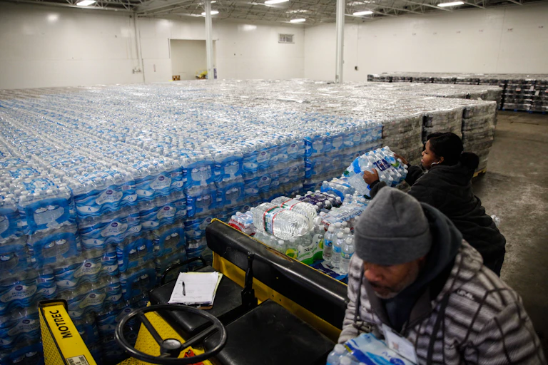 Pallets of bottled water are seen ready for distribution in a Michigan warehouse.
