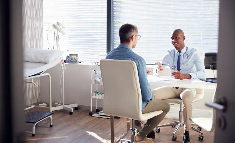 A man seeing a doctor.