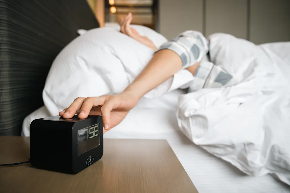 Hitting snooze on your alarm might not actually make you more tired in ...