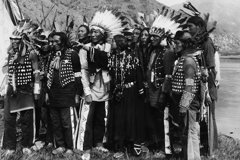 A group of American Indians in traditional dress