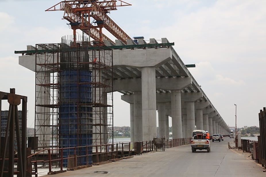 A photo of a bridge that is undergoing construction over Lake Victoria, Tanzania, as part of the Belt and  Road Initiative
