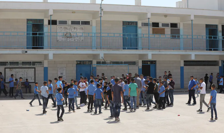 Palestinian children in the playground of a secondary school on the West Bank.