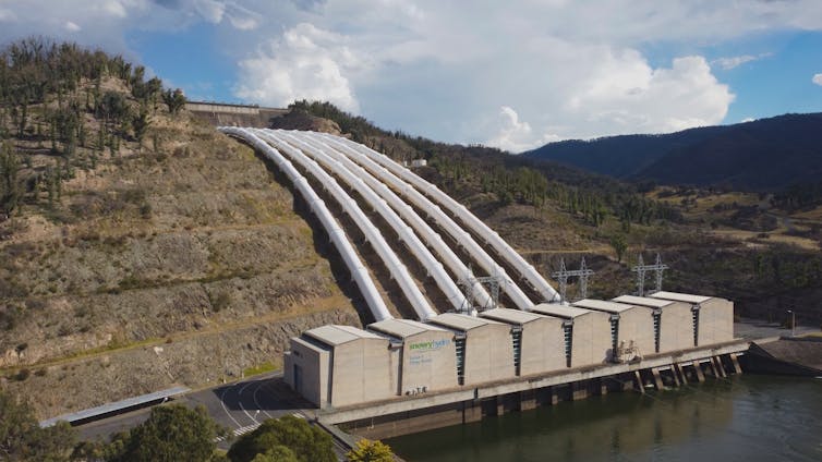 snowy hydro scheme hydroelectricity plant, with pipes and turbines and a lake