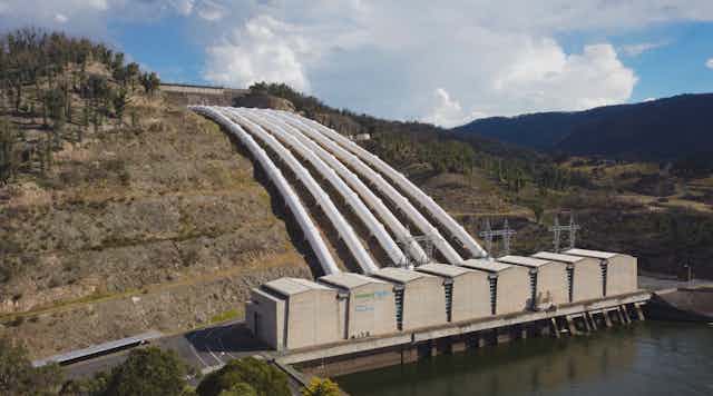 snowy hydro scheme, pipes and turbines on a steep hill