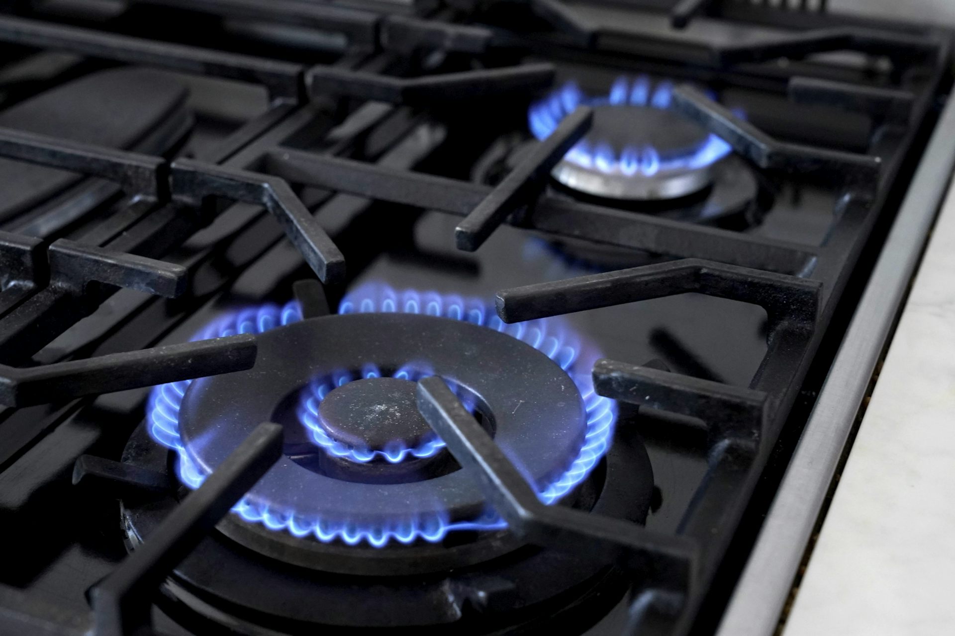 Natural gas being burned from a gas burner.