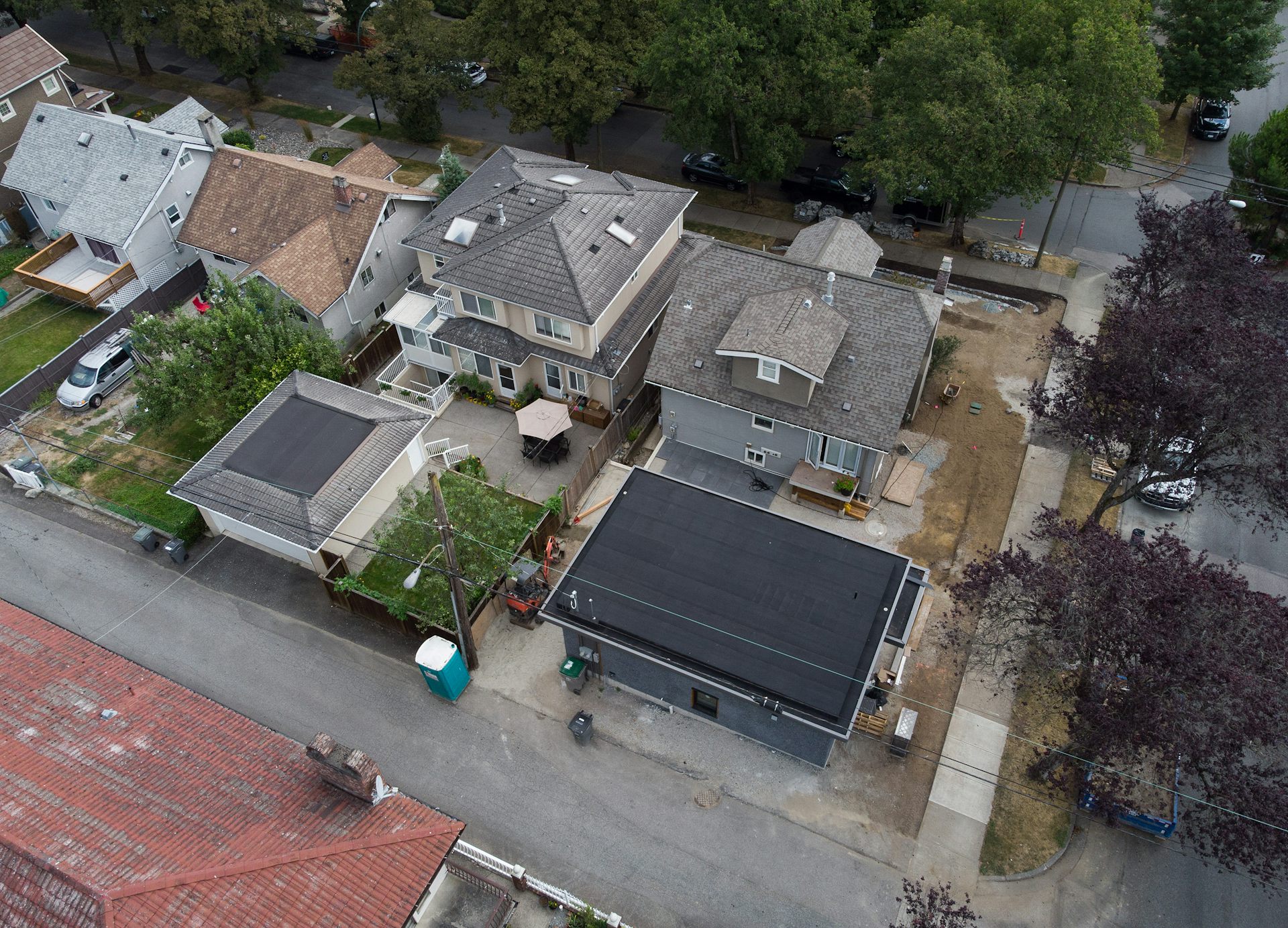 A row of single-family homes seen from the air.