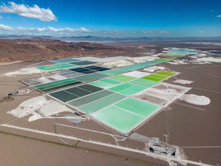 An aerial view of lithium fields in a desert.