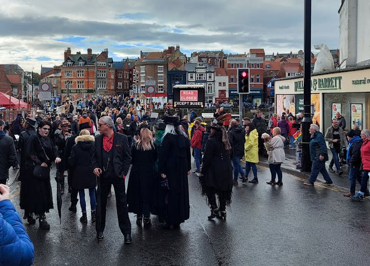 Attendees of the Whitby Goth Weekend, some costumed.