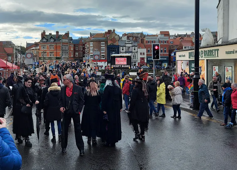 Attendees of the Whitby Goth Weekend, some costumed.