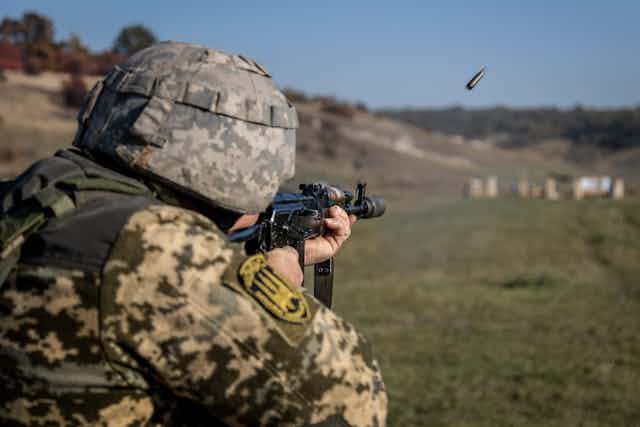 Ukrainian soldier being trained near the frontline.