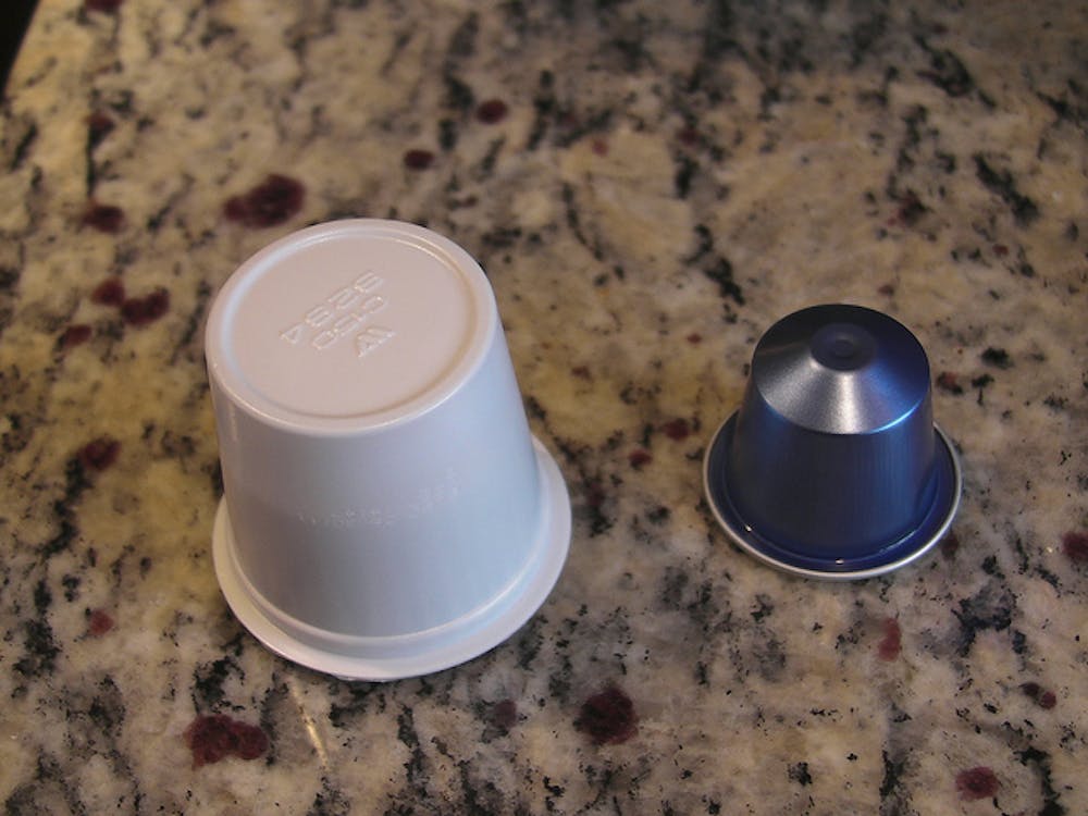 two K-cups sitting on a kitchen counter