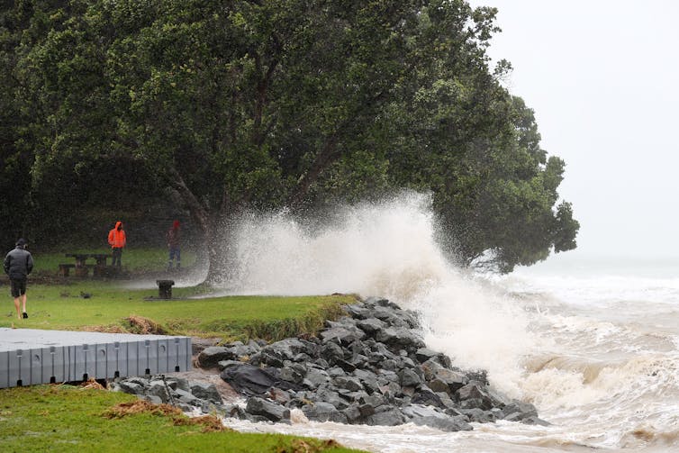 The sea breaching a coastal barrier during Cyclone Gabrielle.