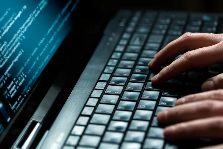 Person using a laptop.