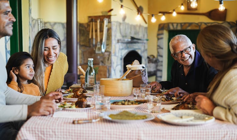 A family eating a meal.