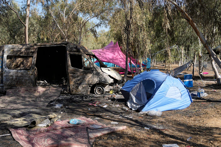 Damaged tents and vans at the site of the Hamas terrorist attack in Israel on October 7.