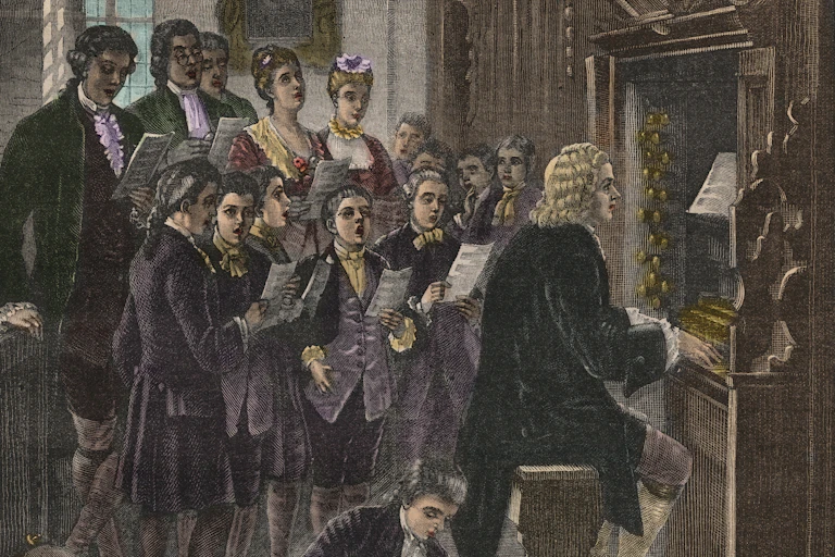 Illustration of man seated at organ while young men and women sing behind him.